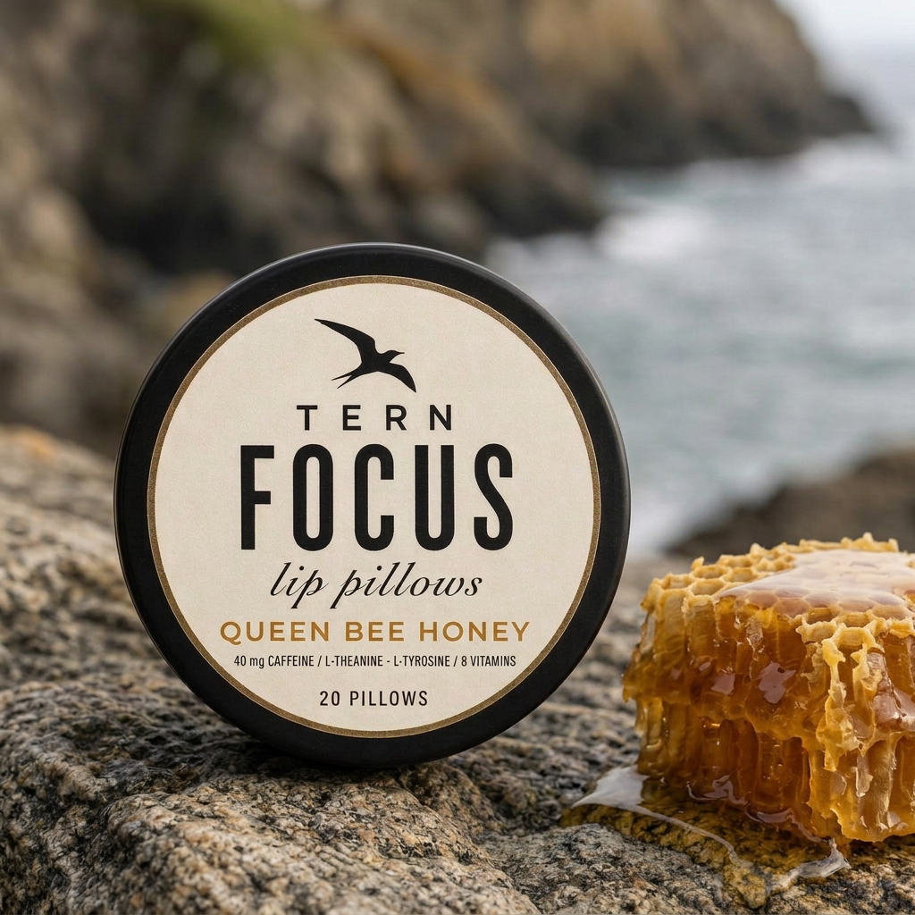 TERN FOCUS lip pillows in Queen Bee Honey beside dripping honeycomb